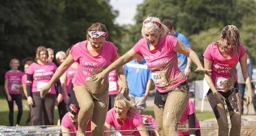 Girls doing an assult course